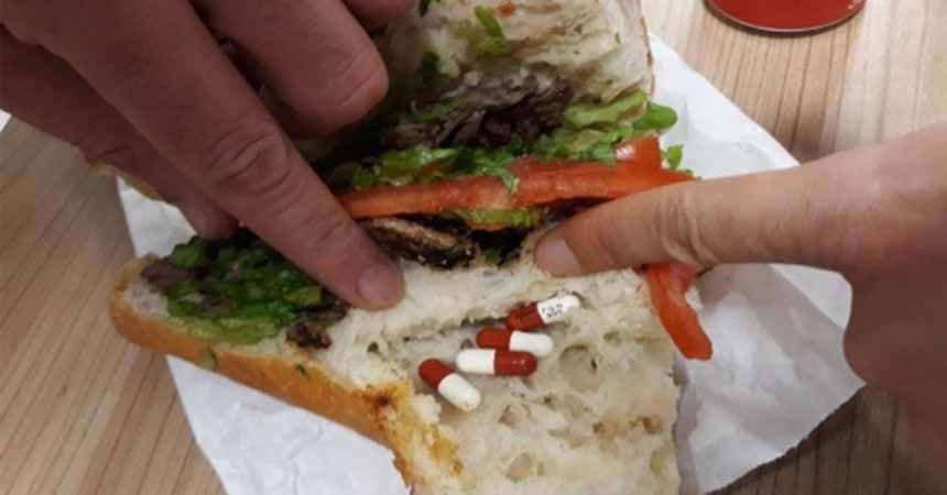 Gözaltındaki arkadaşına ekmek arası hap getirdi!