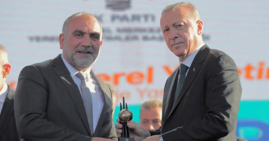 Erdoğan'dan Sandıkçı'ya ödül