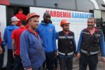 Karabüksporlu futbolcular işçilerle bir araya geldi